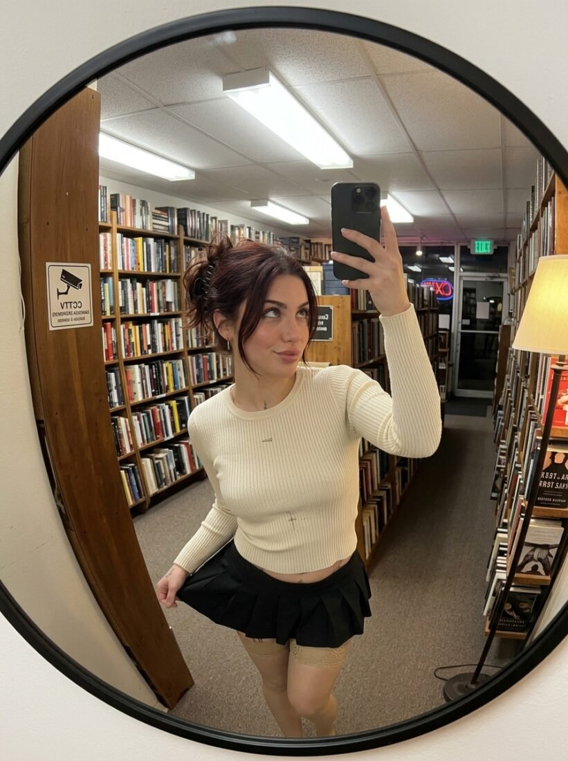Woman_browsing_books_mirror_selfie_202606281034